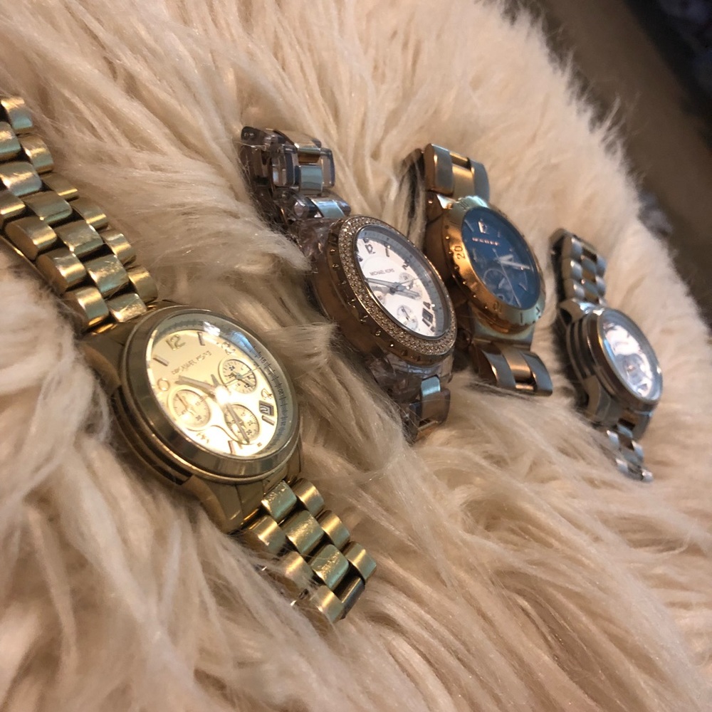Set of 4 Michael Kors watches. Will sell separate